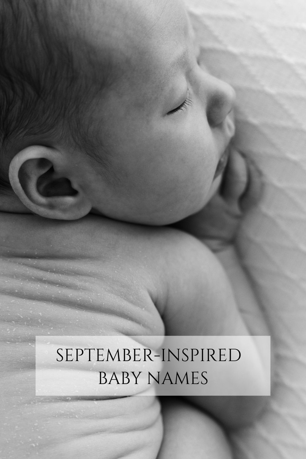 Close up of newborn sleeping peacefully on a white blanket, captured by newborn photographer London – Photography by Valentina.